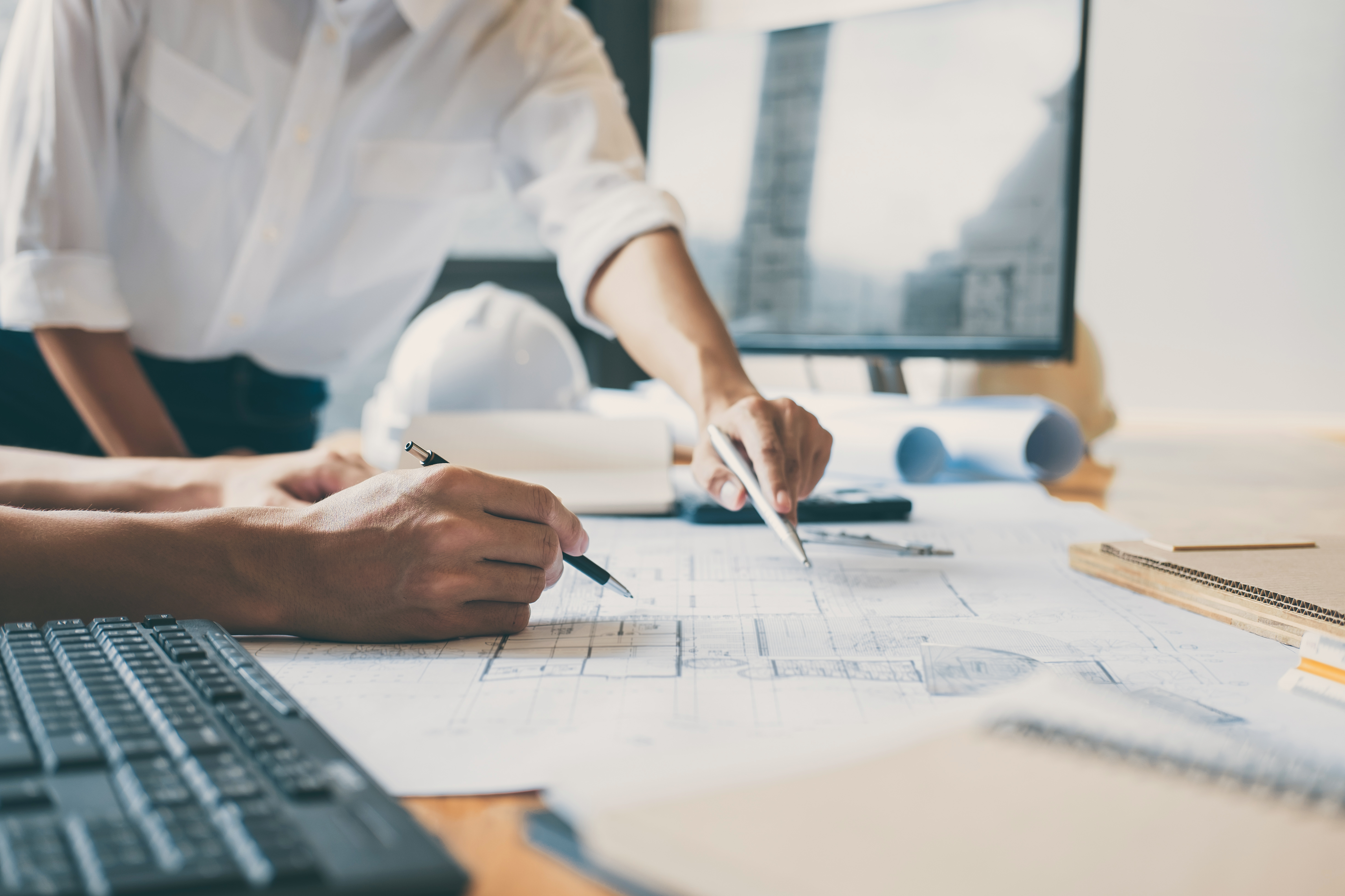 vecteezy_team-of-architects-working_1237293.jpg